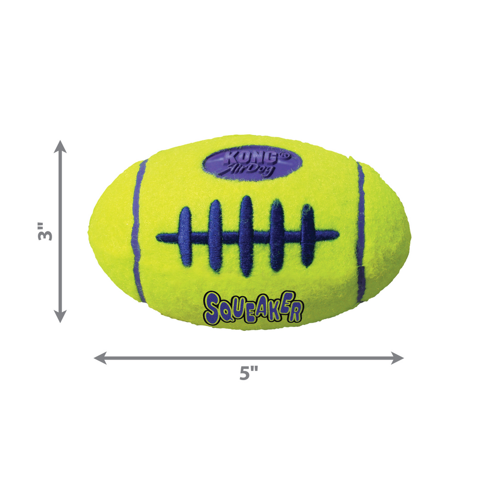 Yellow KONG Squeaker football toy with blue stitching on a white background