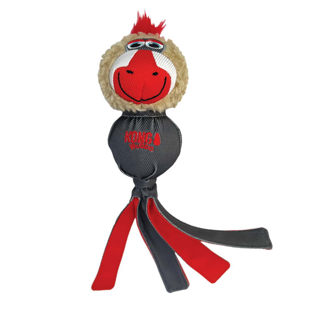 Toy with a monkey face and red and black straps on a white background