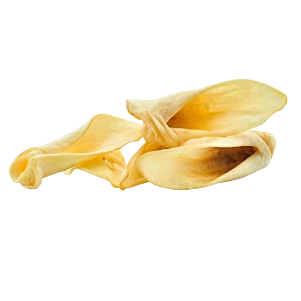 A stack of air-dried lamb ears, with a golden-brown color and a natural, curved shape.