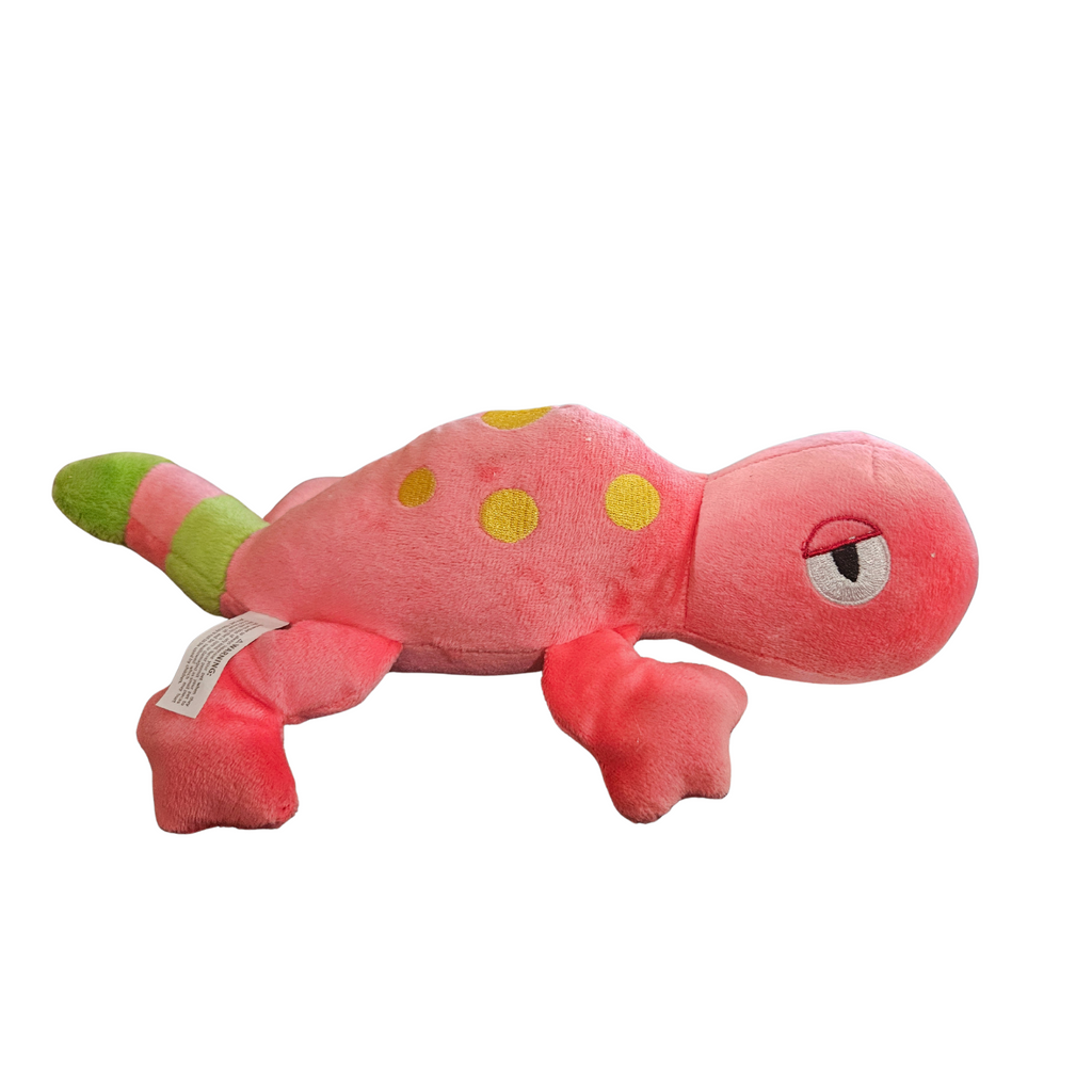 Pink plush toy with green accents on a white background