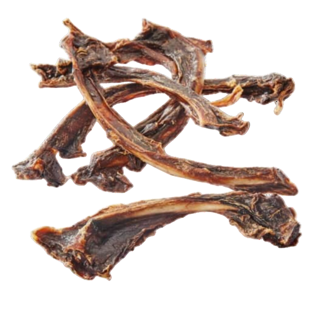 Air dried kangaroo rib pieces on a white background