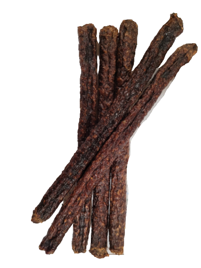 A pack of air dried pure meat sticks, consisting of turkey and sweet potato, against a white background.