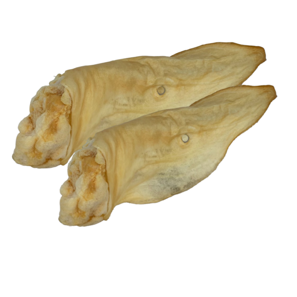 Two air-dried venison ears presented against a white background.